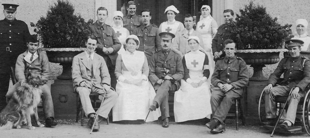 Patients and staff outside the hospital.